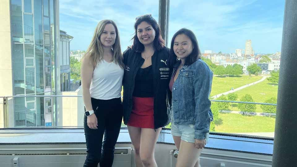 Sonja, Daniela and Amalie in a classroom overlooking Cologne